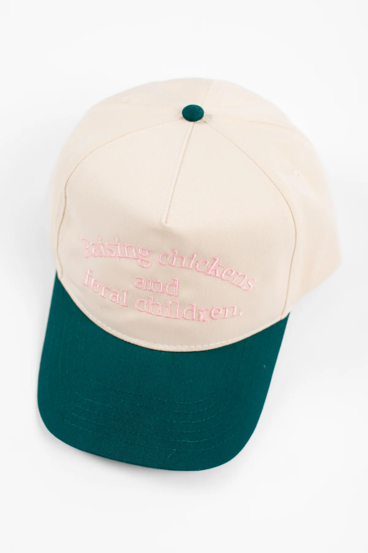 Raising Chickens and Feral Children.' Embroidered Green Trucker Hat
